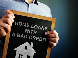 Sticker - Home loans with bad credit written on a blackboard.