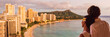 © Maridav - Hawaii couple panoramic vacation travel tourists at Honolulu hawaiian resort hotel banner panorama. Happy man and woman relaxing at sunset view of Diamond Head, Oahu island.