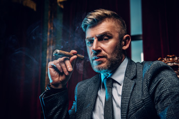 Canvas Print - gentleman smoking a cigar