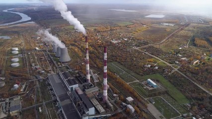 Wall Mural - An energy station that generates heat and electric energy for heating and lighting urban homes. Aerial view.