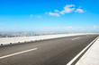 © zhao dongfang - High angle Shanghai city skyline and empty asphalt road
