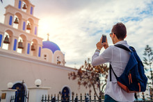 Santorini Traveler Taking Photo Of Church In Akrotiri On Smartphone. Tourism, Traveling, Vacation Concept