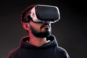 Wall Mural - Man wearing virtual reality headset