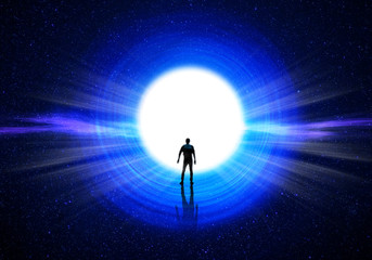 Wall Mural - man silhouette at the end of the tunnel with the universe and blinding light in the background