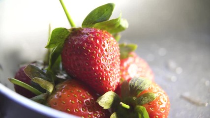 Wall Mural -  strawberry berries close up on a dark background