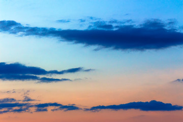 Wall Mural - orange sunset sky with clouds. beautiful nature background