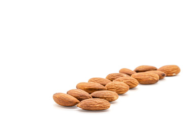 Wall Mural - Almond nuts isolated with white background.