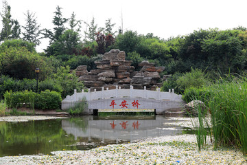 Wall Mural - Chinese traditional stone bridge in the park, Luannan County, Hebei Province, China.