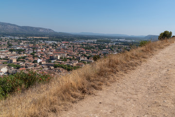 Wall Mural - viewpoint hill pathway view Cavaillon town with mountain background in Provence France