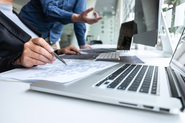 Team of developer programmer working on project in software development computer in IT company office, Writing codes and data code website and coding database technologies to find problem solution