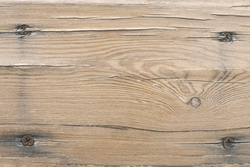 Wall Mural - Flat lay old cracked wooden plank with four screwed-in screws. Modern abstract trendy wood texture background