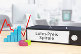 Lohn-Preis-Spirale – Finanzen/Wirtschaft. Ordner auf Schreibtisch mit Beschriftung neben Diagrammen. Business, Statistik