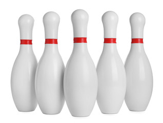 Bowling pins with red stripes isolated on white