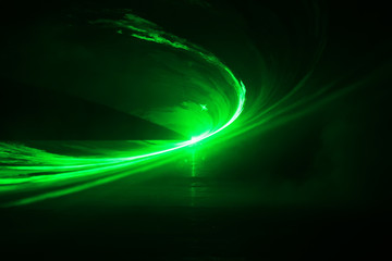  Green laser in black background