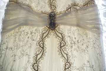 Wall Mural - Detail of a very elegant and exclusive wedding dress.