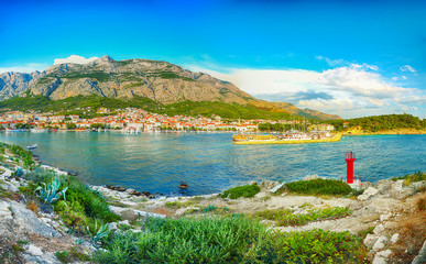 Wall Mural - Splendid View of the resort town of Makarska on a summer day with picturesque harbor