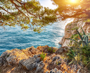 Wall Mural - Beautiful sunset above Adriatic sea and coastline in Makarska.