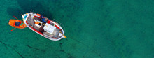Aerial Drone Ultra Wide Photo Of Traditional Fishing Boat Docked In Old Port Of Mykonos Island, Cyclades, Greece