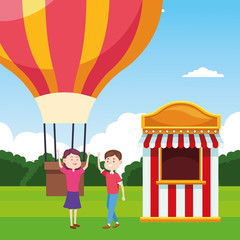 Poster - hot air balloon and happy couple next to ticket booth over landscape background