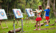 © famveldman - Archery for child. Kids shoot a bow. Arrow, target