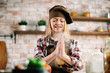 © JustLife - Young little girl playing in kitchen. Close up of girls hand with flour.