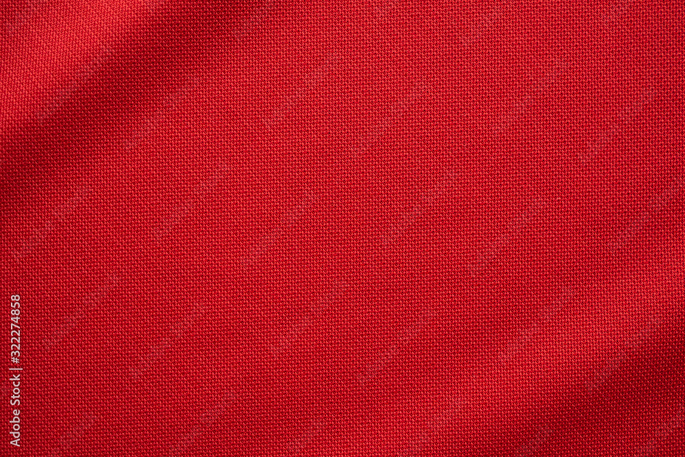 Red sports clothing fabric football jersey texture close up - obrazy, fototapety, plakaty 
