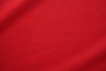 Wall Mural - Red sports clothing fabric football jersey texture close up