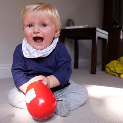 baby boy playing with toys