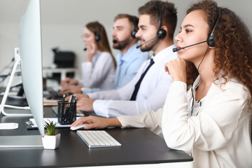 Poster - Technical support agents working in office