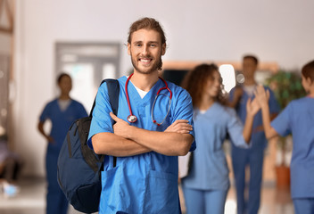 Wall Mural - Male student in corridor of medical university