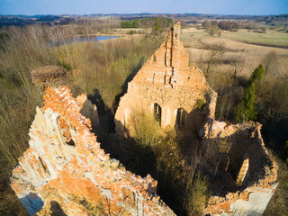 Wall Mural - Ruins of cross shaped Lutheran church in early spring scenery, Gorne, Poland (former Gurnen, East Prussia)