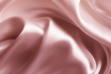 Wall Mural - Satin pink silk background, close-up