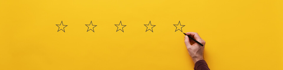 Wall Mural - drawing fiver stars over yellow background
