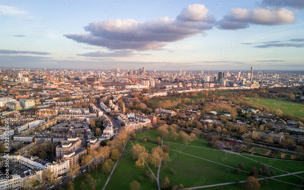 London skyline. Aerial drone photo from Primrose Hill in North London looking south with many key landmarks in view. - obrazy, fototapety, plakaty 