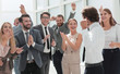 © ASDF - happy business team congratulating young business partners