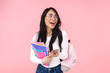 Image of young asian student girl wearing eyeglasses holding folders