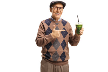 Wall Mural - Elderly vegan holding green smoothie and showing thumbs up