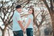 © reewungjunerr - Portrait of young asian couple in love  in the forest,Thailand people happy to be together,Valentine day concept