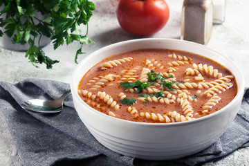 Wall Mural - Tomato soup with fusilli pasta in the bowl