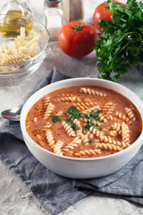 Wall Mural - Tomato soup with fusilli pasta in the bowl