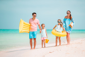 Sticker - Happy beautiful family with kids on the beach