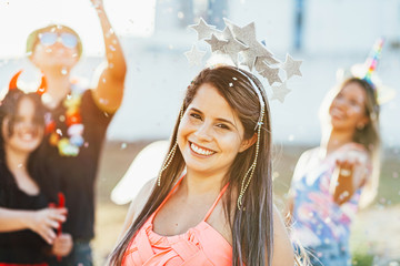 Brazilian Carnival. Group of Brazilian people in costume celebrating the carnival party in the city