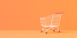 3D rendering Trolley or shopping cart on orange background and copy space for text illustration.