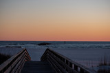Fototapeta Na sufit - beach boardwalk sunset glow