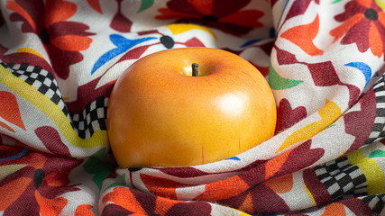 Canvas Print - Apple on scarf low light for food content.