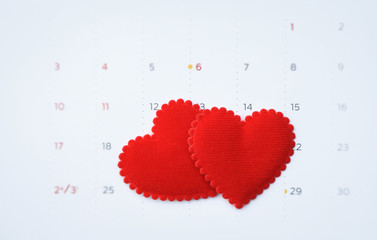 Fabric heart on calendar in Valentine's day concept 