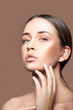 © beauty_objects - Beauty portrait of young model woman with perfect skin, beige background.