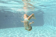 © Morgan Studio - Pretty little girl in swimming pool , summer vacations.