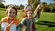 © Svitlana - Happy day. Excited family running outdoors on a sunny day