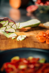 Wall Mural - Cutting Fresh Zucchini - Preparing Vegan Meal